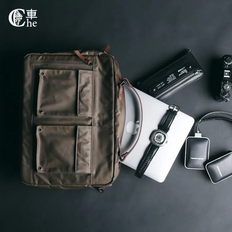 Dpark black laptop bag with a single shoulder strap, sized for a 14 or 15 inch laptop.
