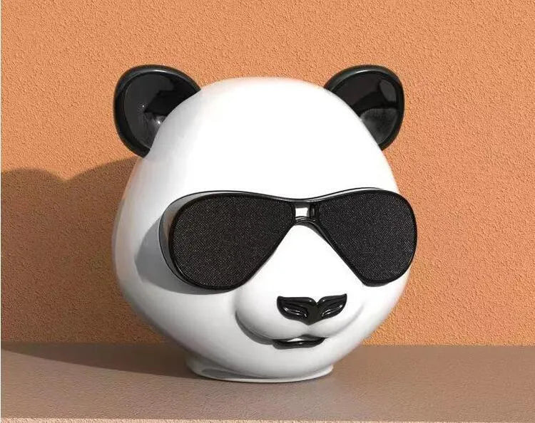 Classic style portable mini Bluetooth speaker showing USB charging port.