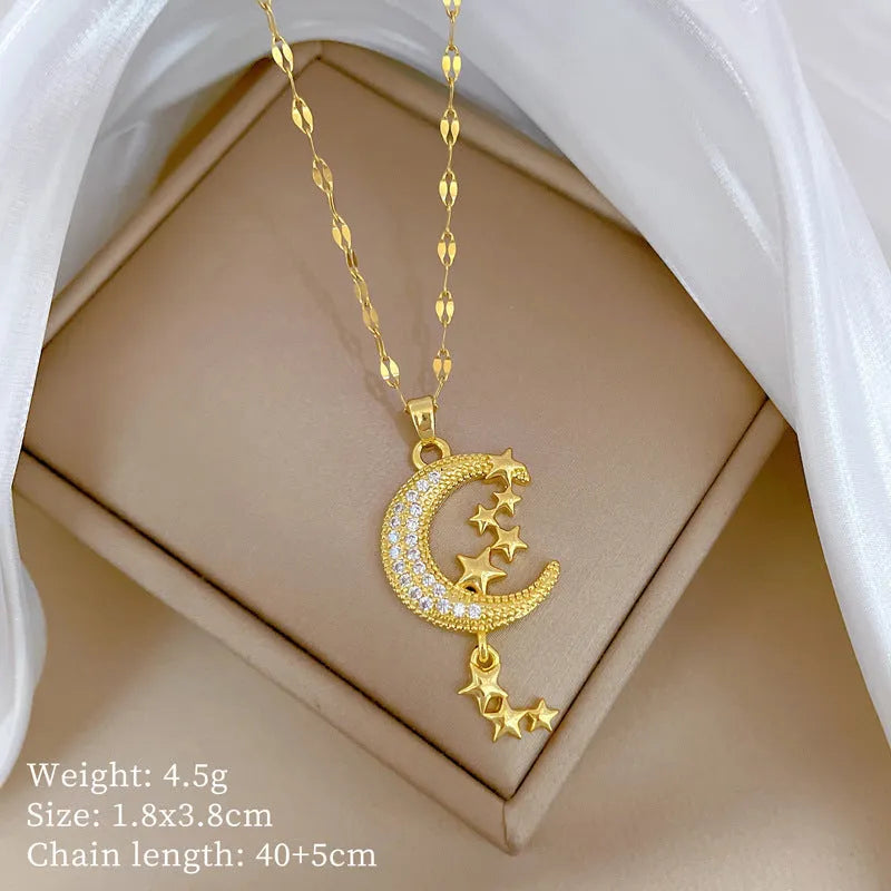 Geometric moon pendant necklace on a stainless steel chain with a copper accent.