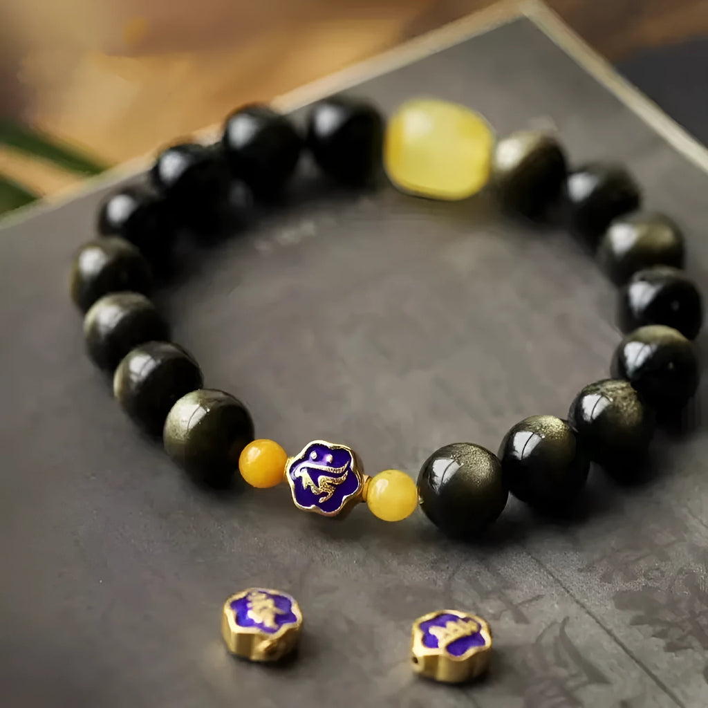 Golden obsidian bracelet with 10mm zodiac animal beads in geometric ethnic design