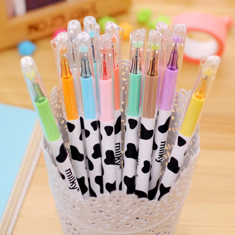 Box of 12 cow print gel pens with assorted colours and 0.38mm fine tips.