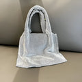 Silver-coloured cotton thread handbag with rhinestone decoration and open-pocket design