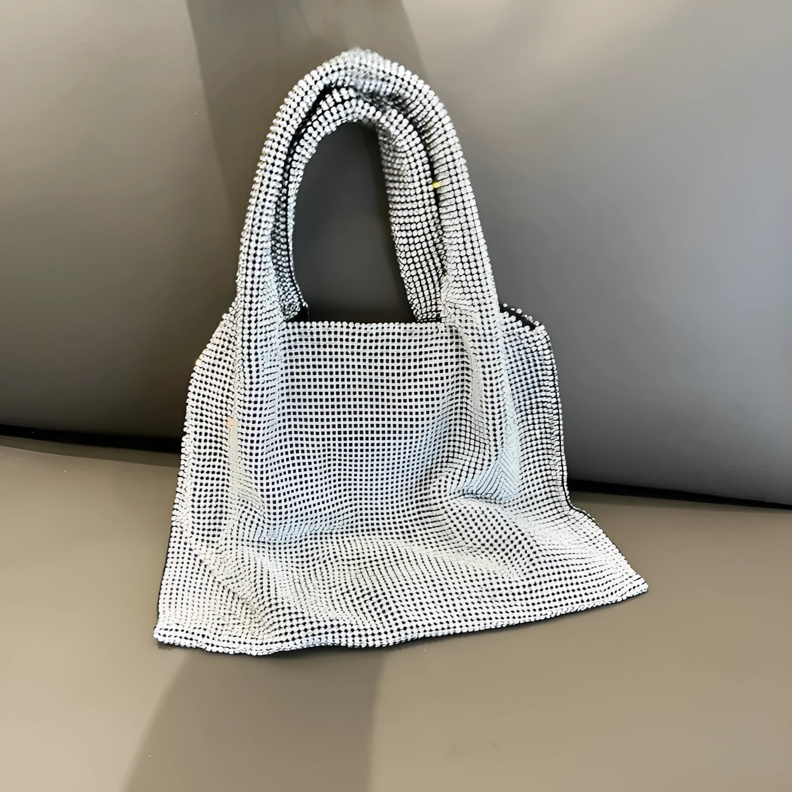 Silver-coloured cotton thread handbag with rhinestone decoration and open-pocket design