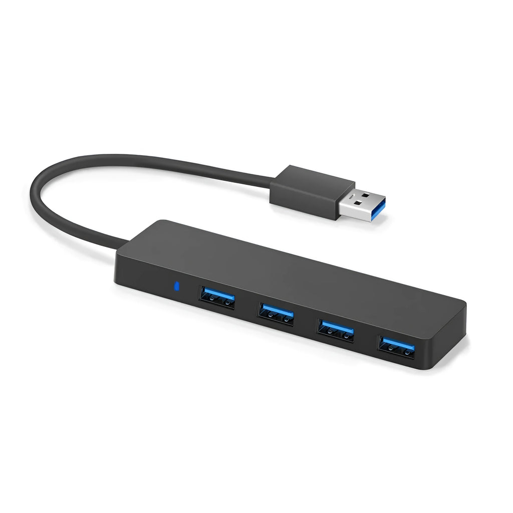 Black USB 3.0 hub with four ports and a 30 cm attached cable on a desk.