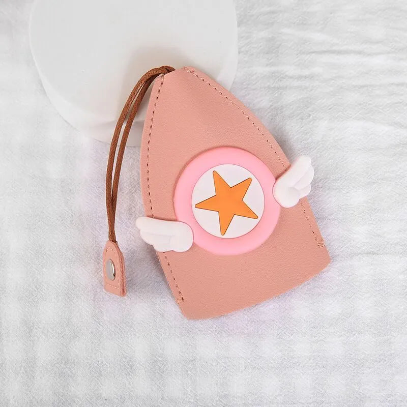 Cartoon pull-out key case in PU leather measuring 14 x 7.5 cm with colourful designs