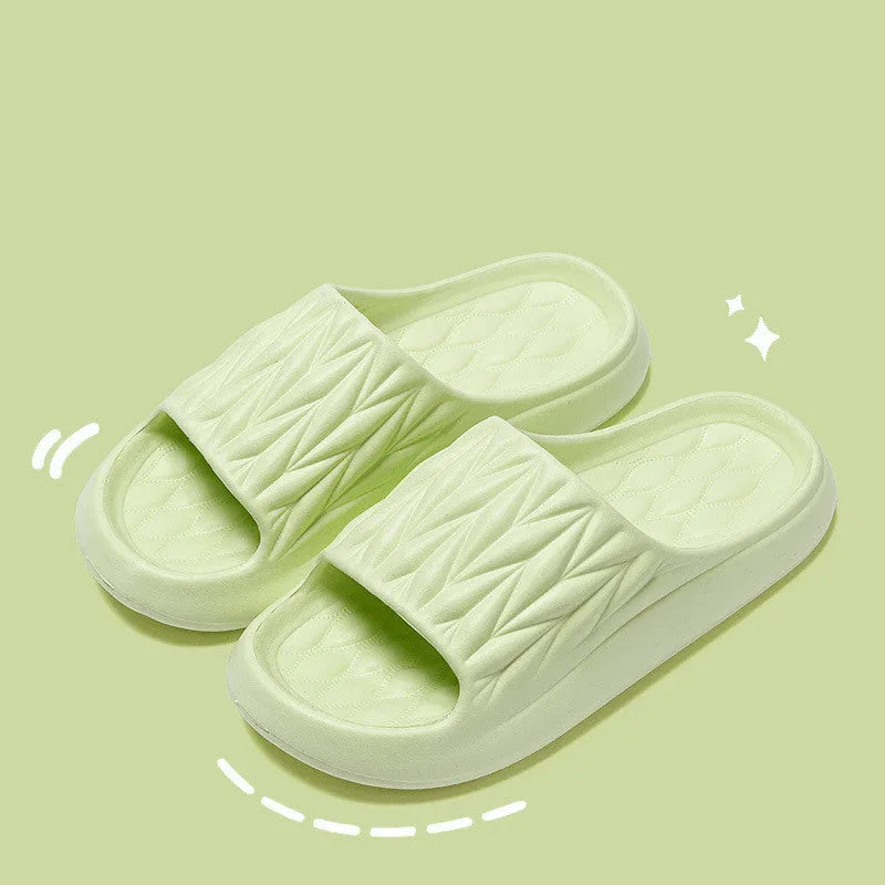 Leaf texture pattern EVA foam slippers for men and women in various colours on a white background.