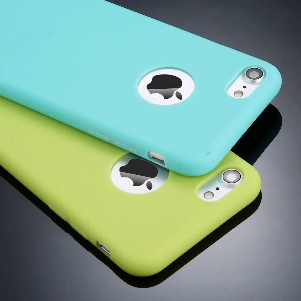Soft silicon TPU phone case for iPhone in candy colours including pink, blue, and black on a white background.