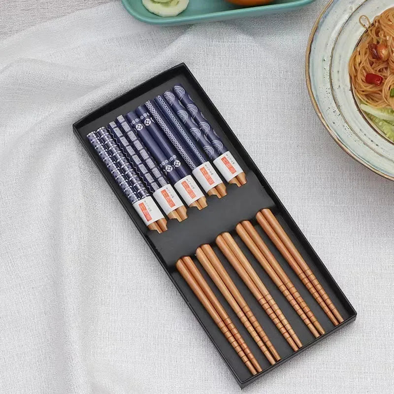 Set of five pairs of bamboo chopsticks with Japanese Lucky Cat and blue wave patterns in a gift box.