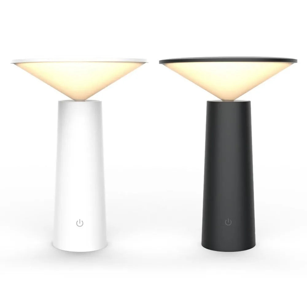 Black USB rechargeable desk lamp with touch sensor, tilted head, and 36 LED light source on a wooden table.