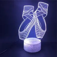 3D ballet dancer LED night light with remote control showing multiple colour options on acrylic panel.