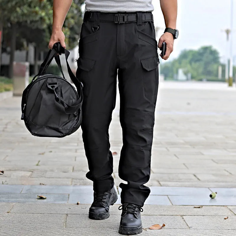 Men's camouflage stretch trousers in X9 khaki, loose fit, chemical fibre blend, outdoor wear