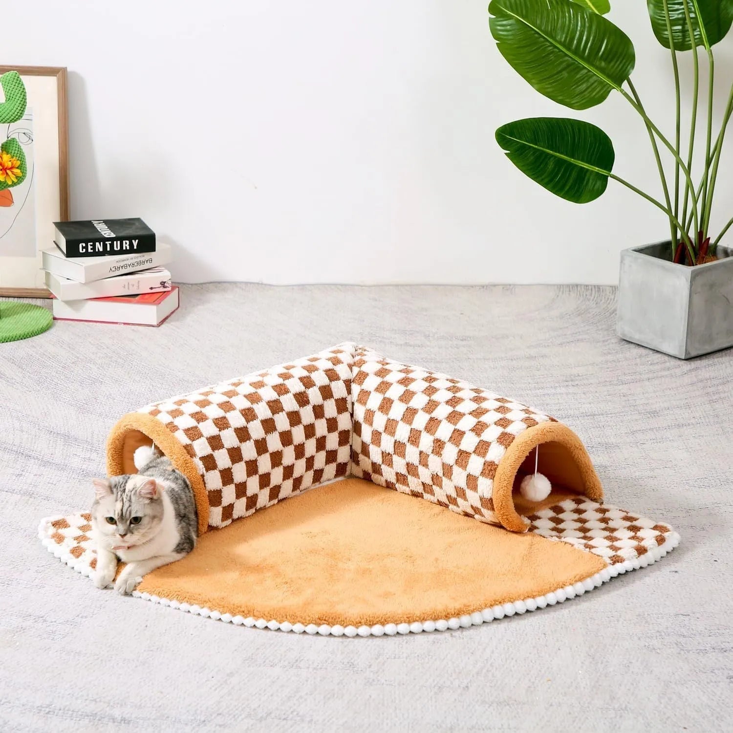 Soft plush fan-shaped 2-in-1 pet bed and tunnel for dogs and cats in plaid design.