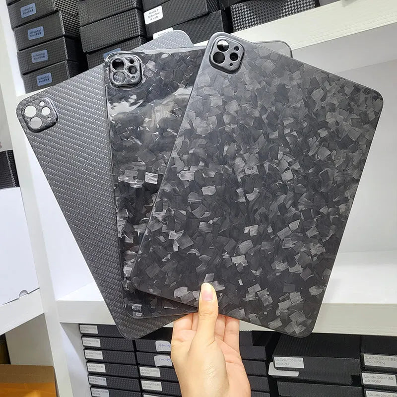 Genuine carbon fibre hard protective case for Apple iPad Pro 11 inch in matte and forged finishes.