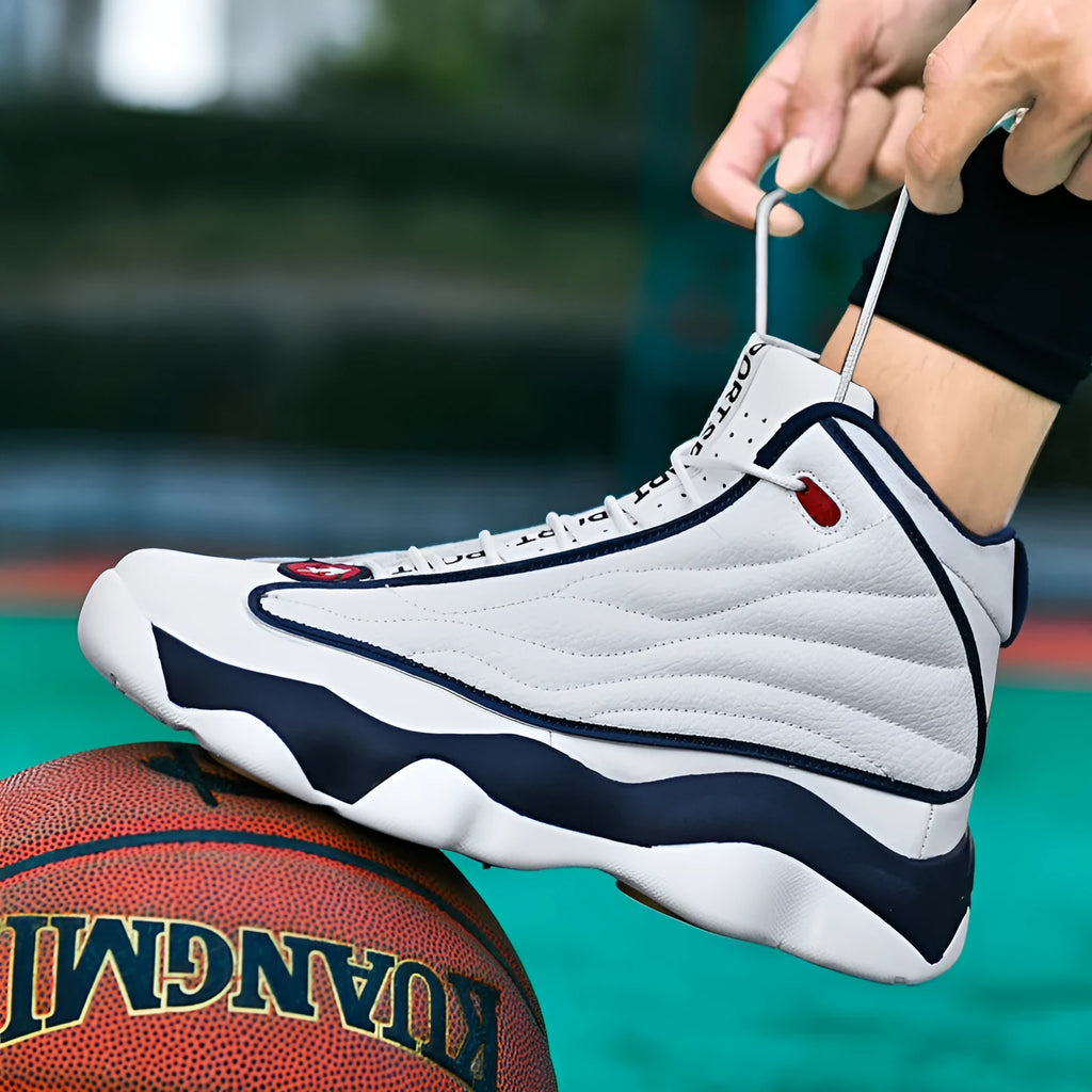 High-top basketball trainers in AJ13 colours with mesh upper and thick rubber sole.