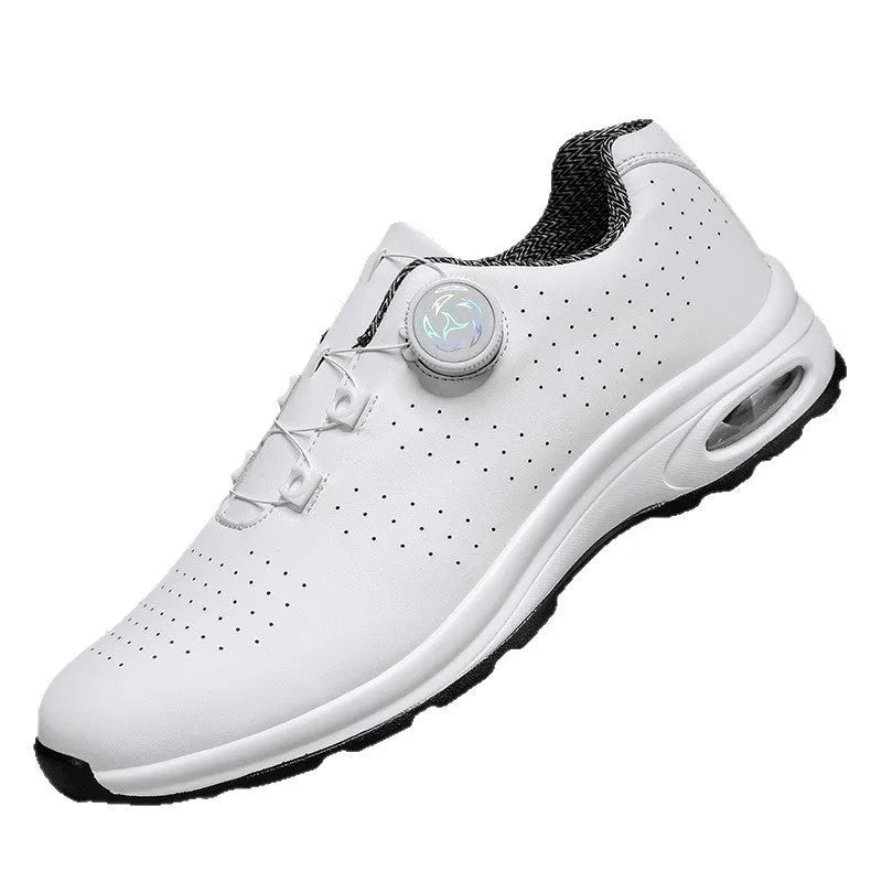 Black and white low top mesh casual shoes with lace-up front and cross shoulder straps on a composite sole.