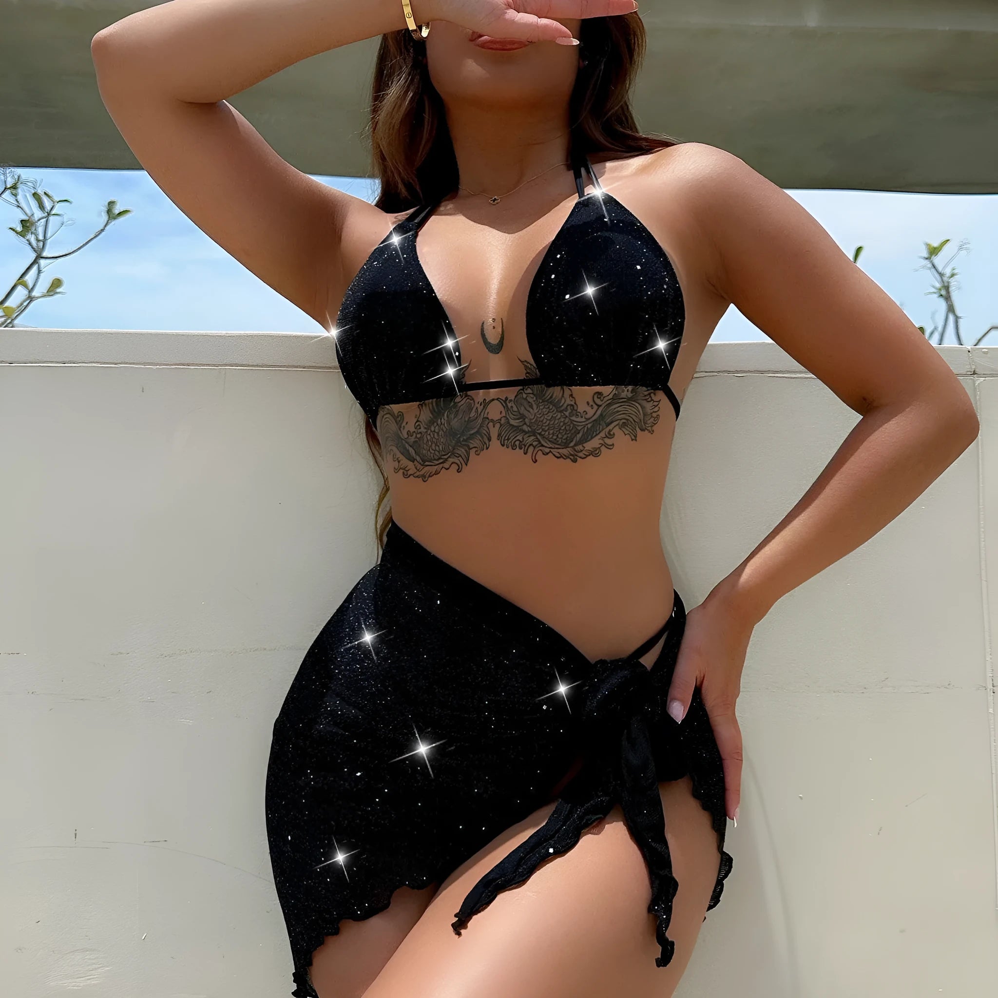 Black three-piece swimsuit bikini set with adjustable top and matching shorts