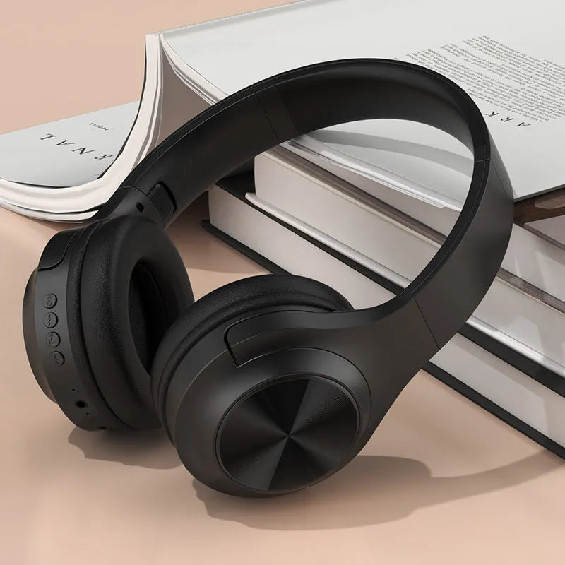 Creative design wireless Bluetooth headset shown in Ivory White, Chalk Black and Youth Green colour options.