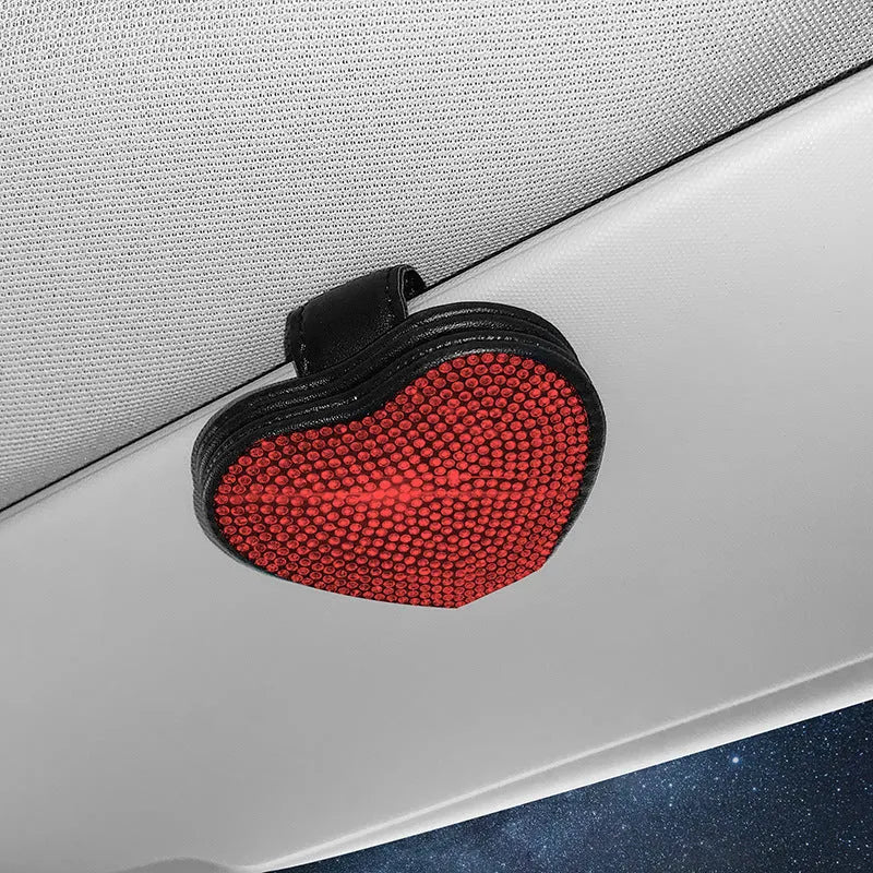 Black PU leather car sun visor clip with diamond accents holding sunglasses and a ticket.