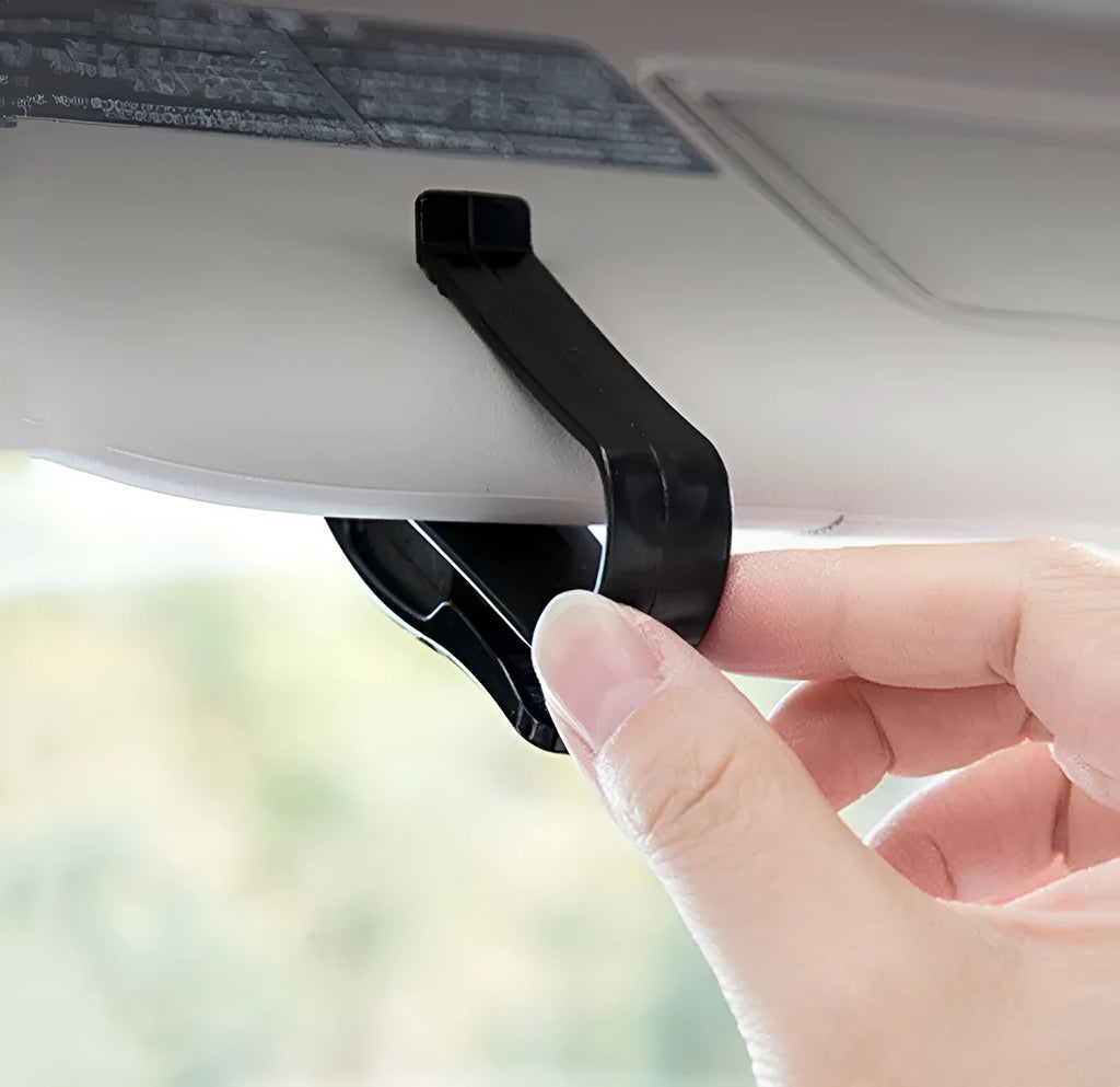 Black plastic car sun visor clip for glasses and cards measuring 6.5cm long