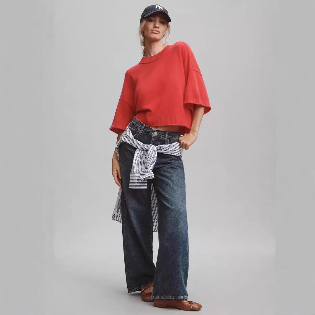 Red cropped t-shirt with exposed navel design and short sleeves on mannequin