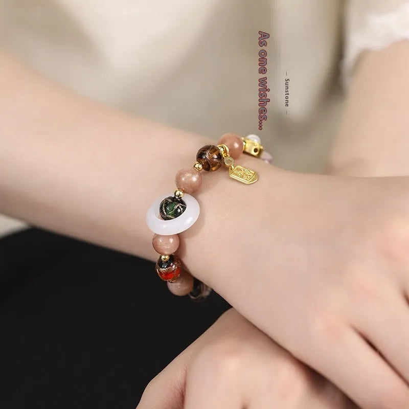 Hand-woven women's bracelet with fragrant gray glaze Sunstone and white lip shell beads