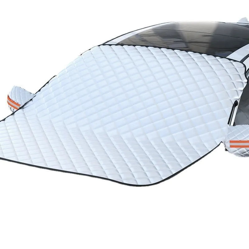 Large aluminium foil winter car cover with reflective stripes and magnets, shown fitted on an SUV front windshield.