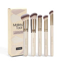 Apricot coloured MAANGE five-piece synthetic makeup brush set with angled blush brush.