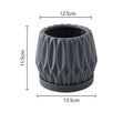 Medium grey ceramic tabletop plant pot for flowers and green plants