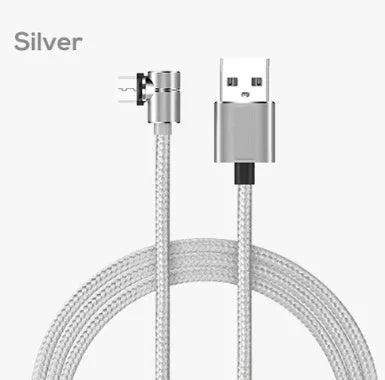 Black aluminium alloy magnetic charging cable with L-shaped plug on a wooden table.