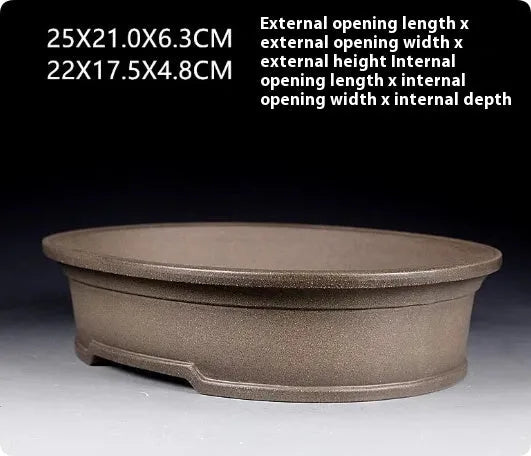 Handmade antique oval bonsai pot in purple sand clay measuring 25x21x6.3 cm