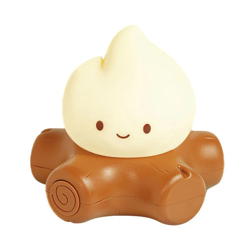 Small silicone fire pile cartoon night lamp with yellow light, showing compact design and ABS shade.
