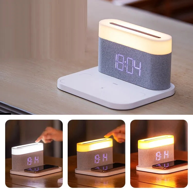 Black or white table lamp with wireless phone charging pad and digital clock display