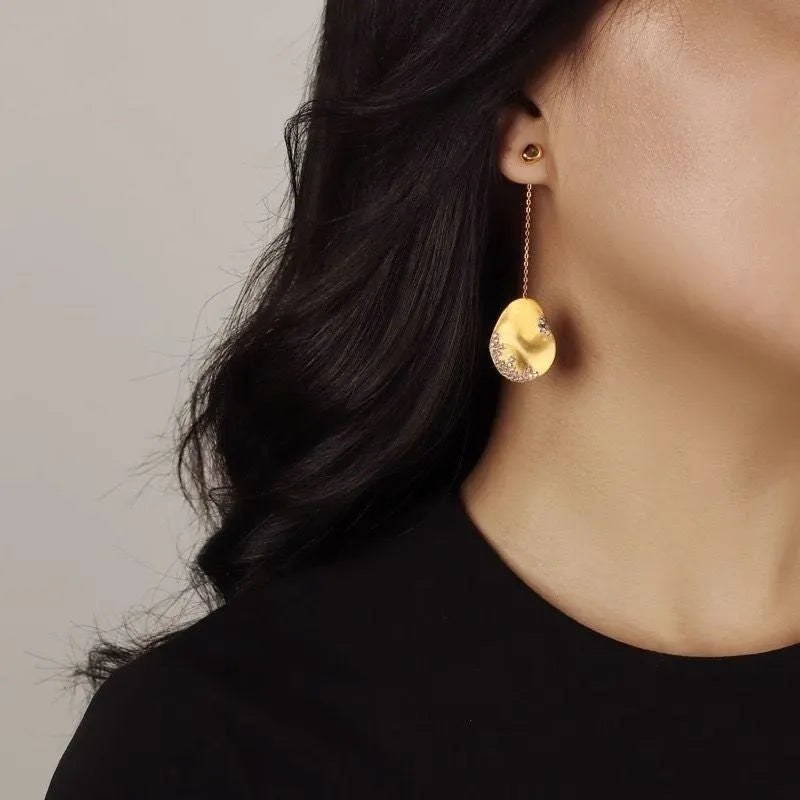 Asymmetric floral earrings with zircon stone centrepiece in gold or silver plating