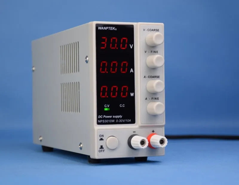 White S605W adjustable DC laboratory bench power supply unit with voltage and current dials.