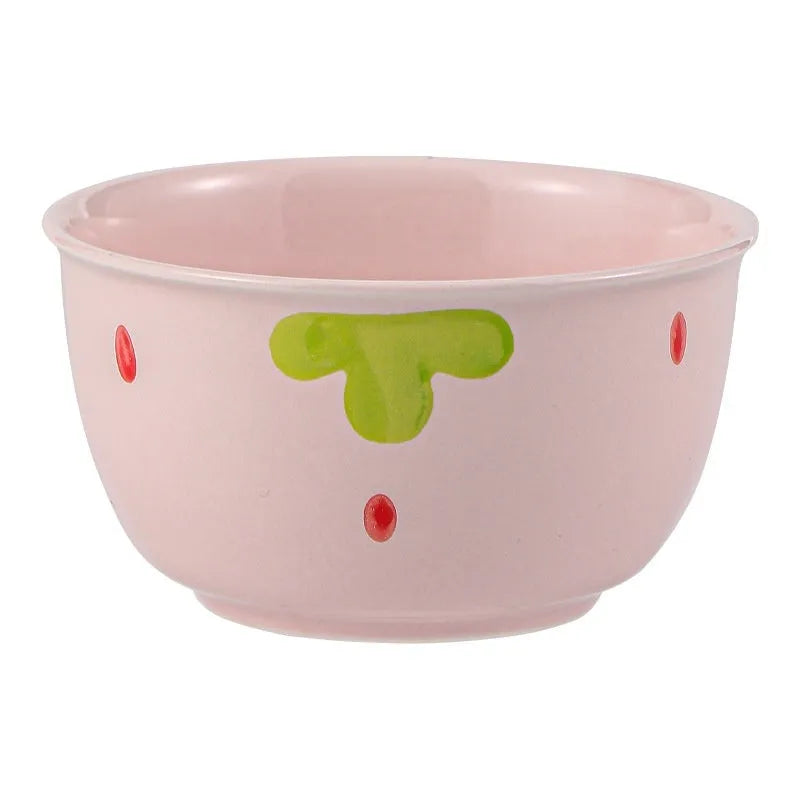 Porcelain dinnerware set with strawberry pattern includes bowls, plates, and spoon