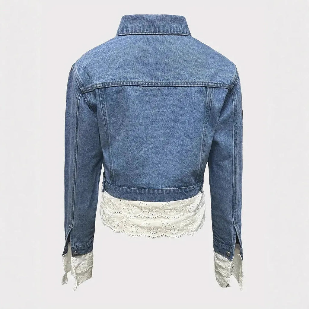 Blue denim jacket for women with lace stitching detail on the front, long sleeves.
