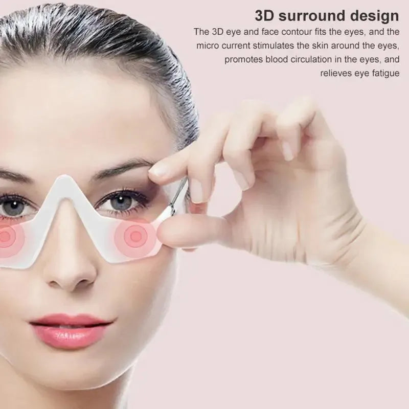 3D micro-current eye massager with glasses design on a pink background.