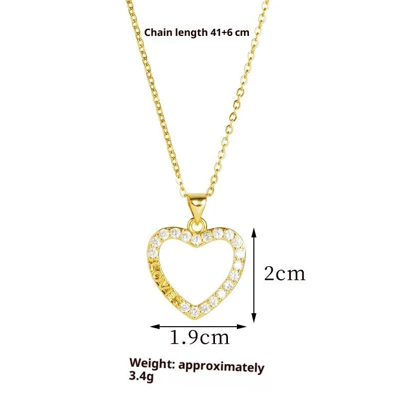 Gold light luxury necklace and earrings set with heart-shaped pendant and butterfly motif on copper alloy