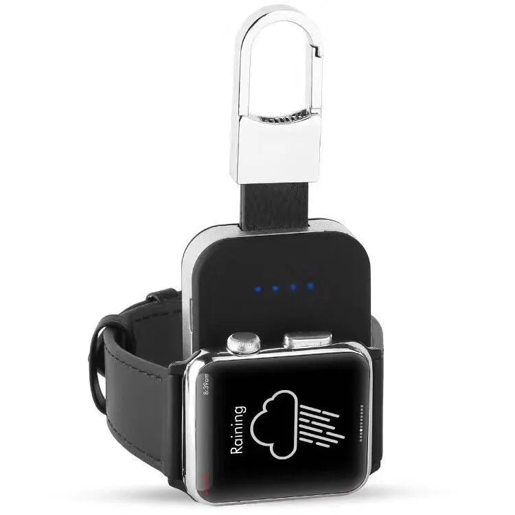 Black Apple Watch wireless charging power bank on a keychain, showing compact size.