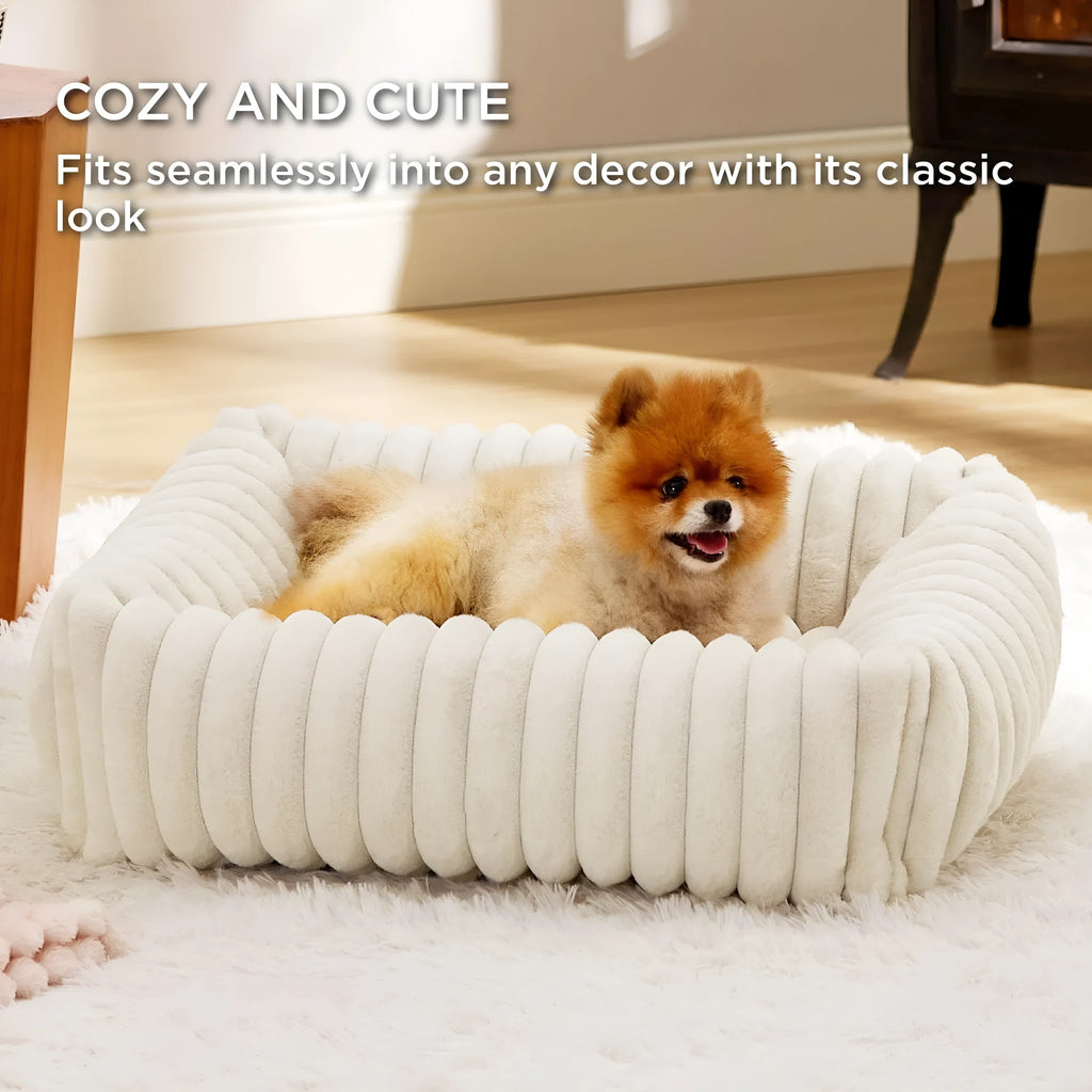 Beige raised-side pet bed for a medium-sized dog, showing padded base and supportive sides.