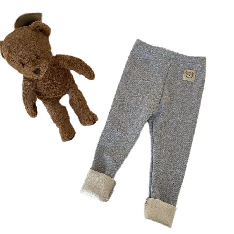 Girl's high-waist fleece-lined winter leggings in solid colour with wool lining and hair band belt.