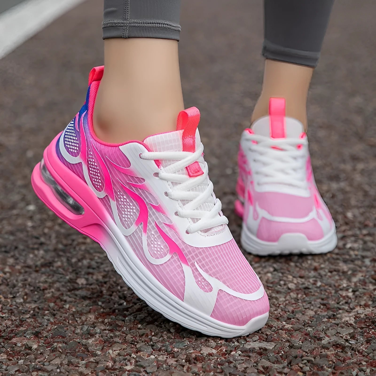 Women's casual sneakers with mesh upper and PU sole in pink, plum red, or moonlight colour.
