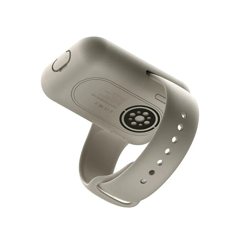 Apple Watch portable wireless charging case and silicone cover in brown, midnight blue, or starlight.
