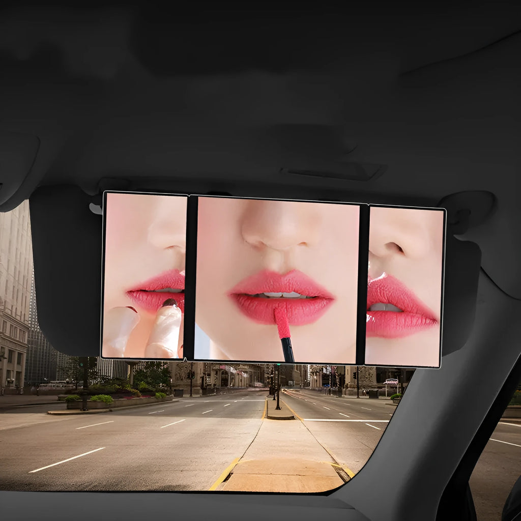Silver car folding makeup mirror shown closed at 15.5 cm and opened at 30.5 cm wide.