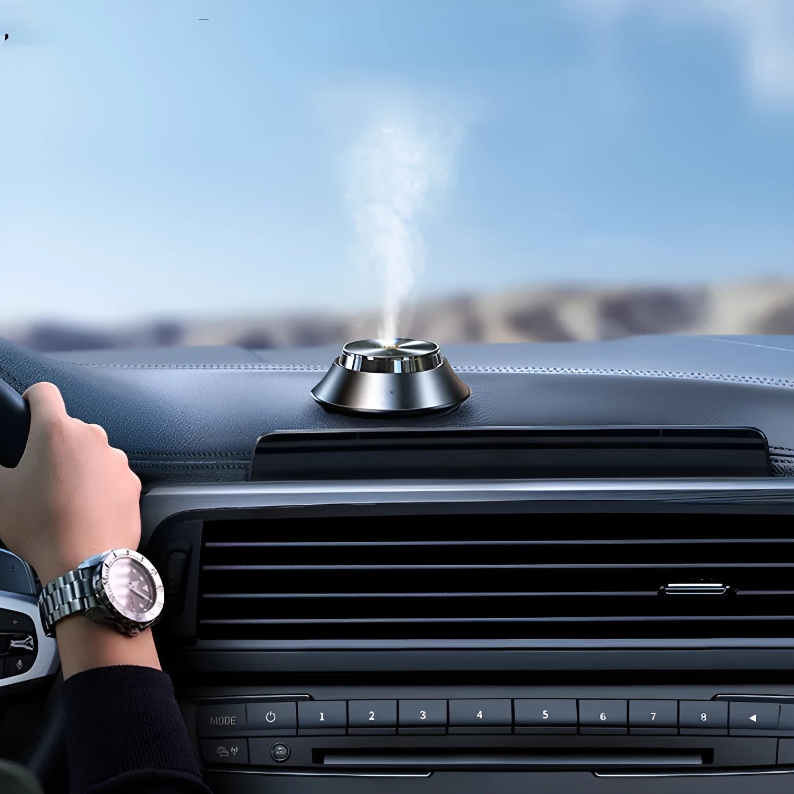 Black butterfly-design metal car aromatherapy air purifier with USB cable and oil bottle.