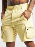 Man's black quick-drying sports shorts with elastic waistband for fitness and running activities.
