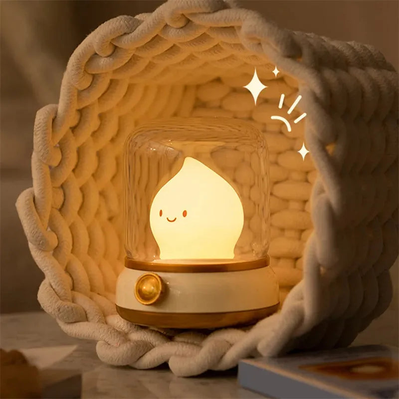 Green retro-style USB rechargeable LED night lamp with dimmer knob on wooden table
