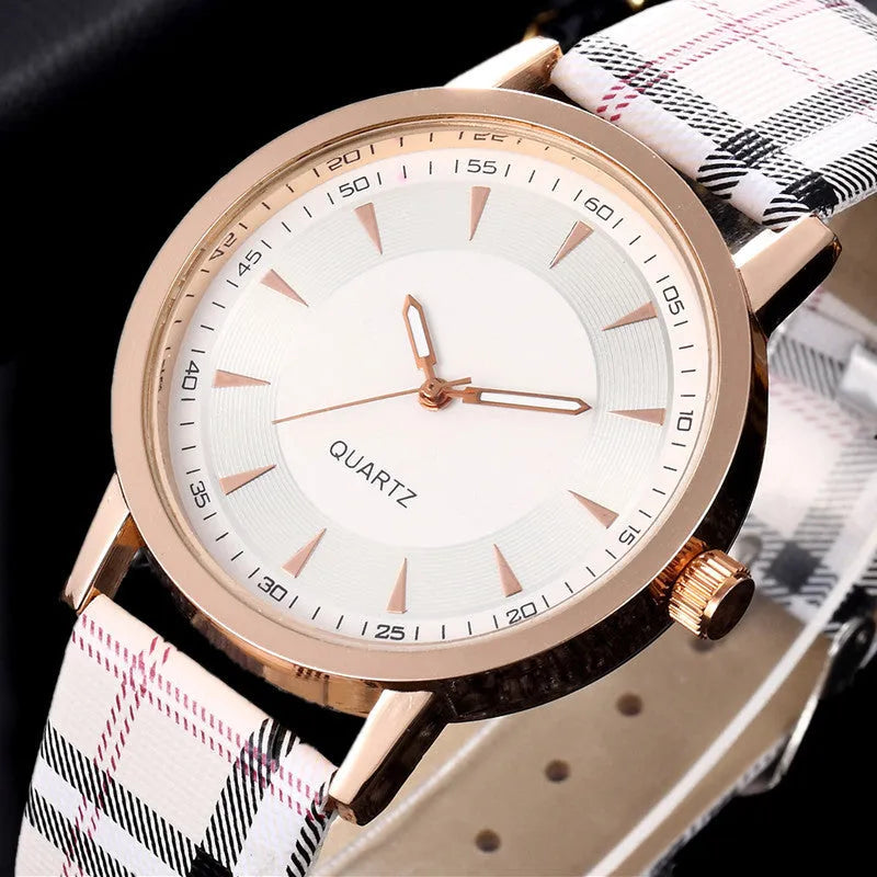 Women's fashion belt watch with round dial, leather strap, gold black colour, stainless steel case