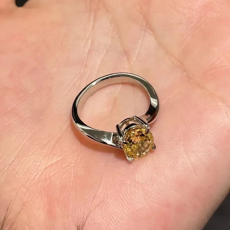 Women's yellow rock sugar crystal ring on copper with Seiko treatment showing colour and detailing