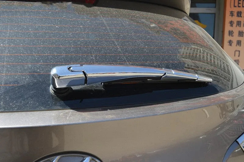 Set of four silvery black ABS plastic rear wiper trim covers for a Hyundai car.